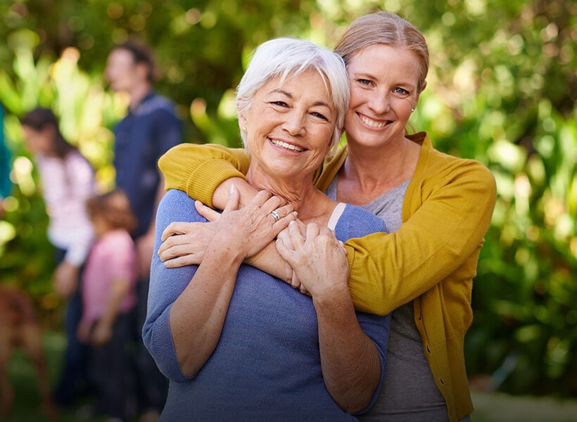 two woman hugging